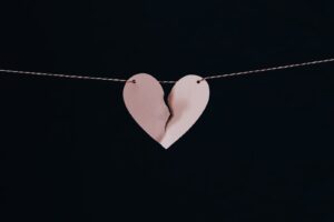 broken heart hanging on wire